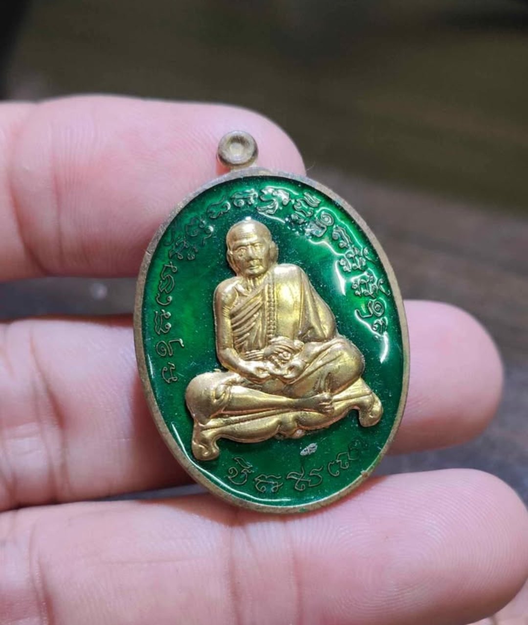 เหรียญหลวงปู่หมุน วัดบ้าน จาน รุ่นมหาเศรษฐี 2543 เนื้อ ทองเหลืองลงยาเขียว